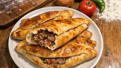 Evde kır pidesi: dışı hafif çıtır, içi yumuşak kıymalı pide tarifi